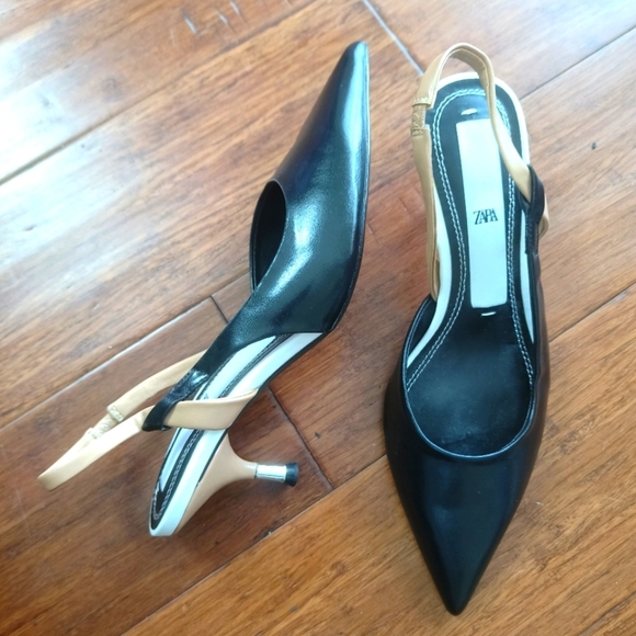 Zara Shoes - Zara white and black heels with silver heels size 6 used in good condition..‎